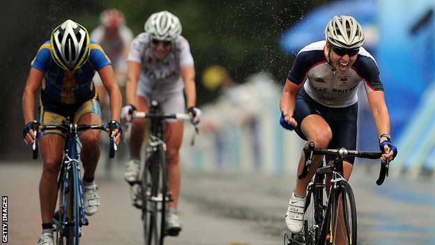 Nicole Cooke crossing the finish line to win Olympic gold in Beijing