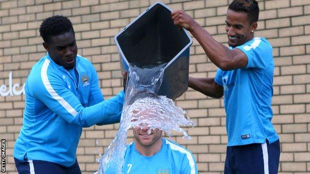 Micah Richards, Scott Sinclair and James Milner taking part in the ice bucket challenge in 2014
