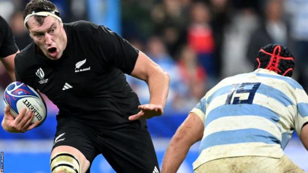 Brodie Retallick running with the ball for New Zealand