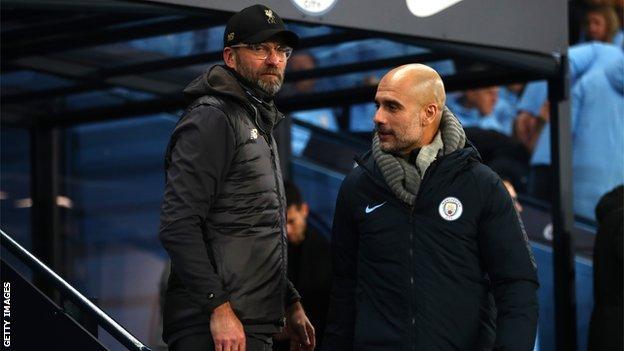 Liverpool manager Jurgen Klopp (left) and Manchester City's Pep Guardiola