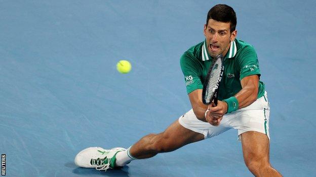 Novak Djokovic returns in his Australian Open quarter-final against Alexander Zverev