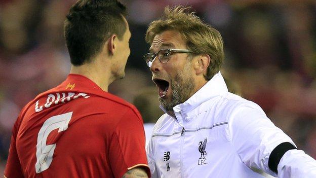 Liverpool defender Dejan Lovren (left) and Reds boss Jurgen Klopp