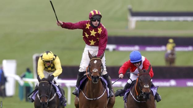 Jack Kennedy celebrates after winning the 2021 Cheltenham Gold Cup on Minella Indo