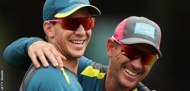 Tim Paine and Justin Langer share a joke