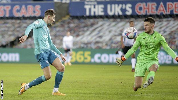 Freddie Woodman did well to deny David Brooks after his loose pass gave the Wales international a chance to open the scoring