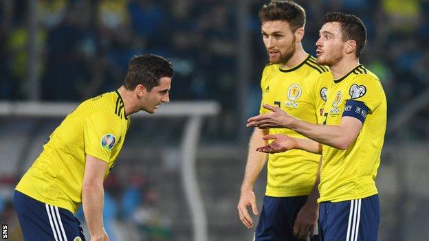 Kenny McLean, Stephen O'Donnell and Andy Robertson