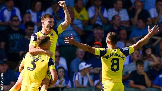 Ben Woodburn celebrates scoring for Oxford