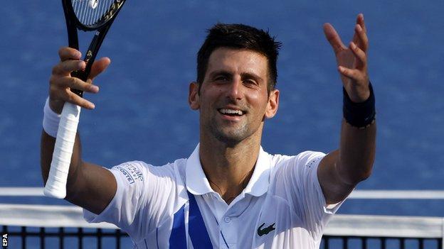 Novak Djokovic celebrates winning at the Western and Southern Open