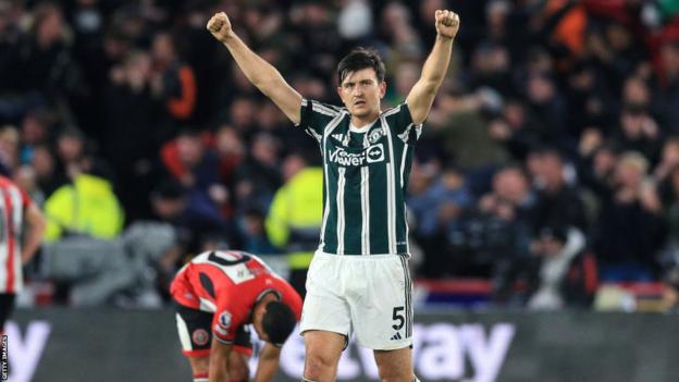 Harry Maguire celebrates victory over Sheffield United