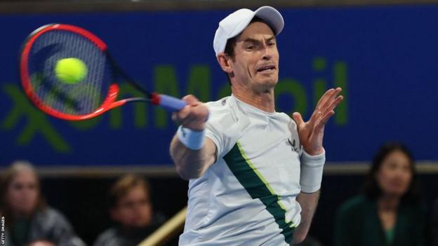 Britain's Andy Murray hits a return against Germany's Alexander Zverev in their Qatar Open match