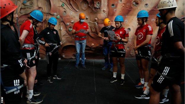 The Wales players prepare for rock climbing - Wales’ Laura O’Sullivan, Charlie Estcourt, Georgia Walters, Siobhan Humphrey (Team Operations Manager), Loren Dykes (Coach), Luke Taylor (Coach) during a team building session at The Llangorse Multi Activity Centre, Gilfach Farm, Llangorse, Brecon, Wales