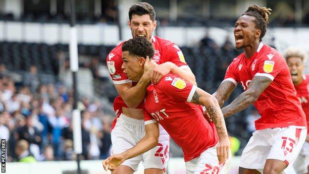Brennan Johnson and his Nottingham Forest team-mates celebrate his equaliser against Derby County