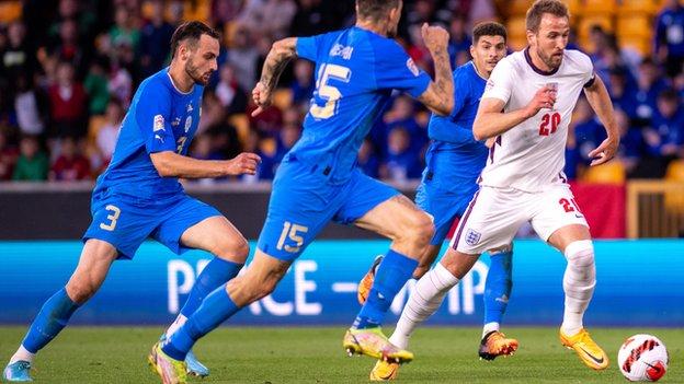 Harry Kane (right) in action against Italy