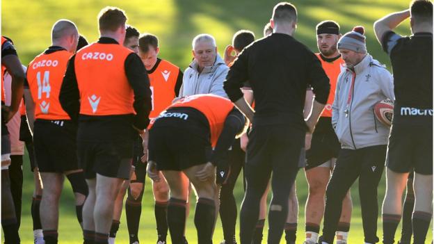 Warren Gatland with Wales players in training