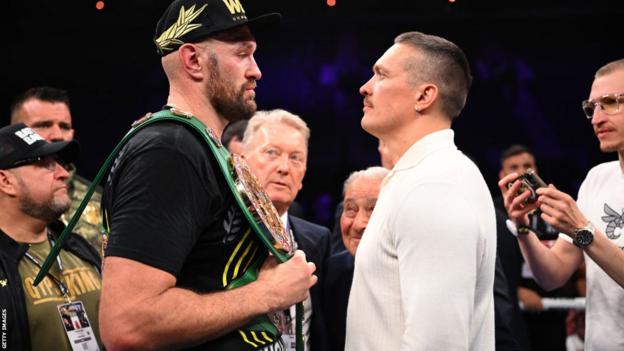 Tyson Fury and Oleksandr Usyk face off after the Heavyweight fight between Tyson Fury and Francis Ngannou