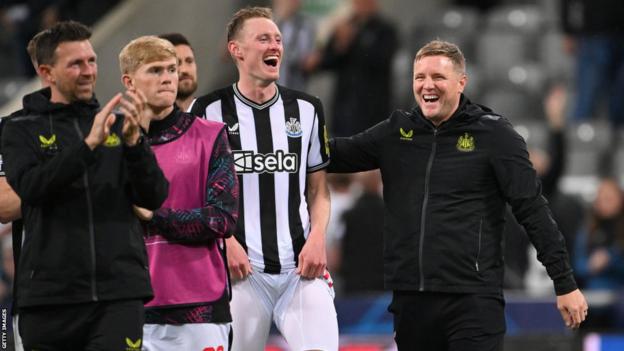 Newcastle manager Eddie Howe celebrates a win over Paris St-Germain with his players in October