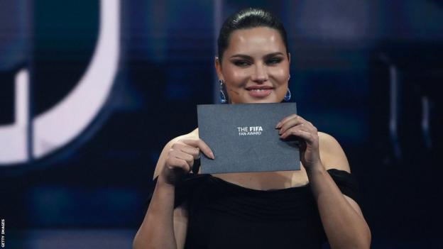 Adriana Lima presents the fan award at the Best Fifa Awards in Paris on Monday