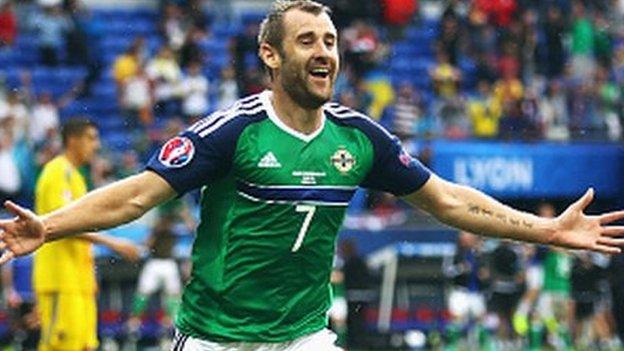 McGinn celebrates after scoring in Northern Ireland's historic 2-0 win over Ukraine at Euro 2016