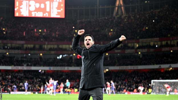 Mikel Arteta celebrates after Arsenal go 3-1 up against Liverpool in the Premier League