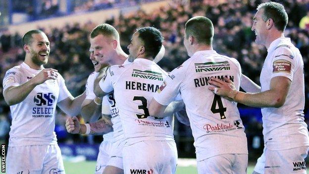 Widnes celebrate Kevin Brown's try