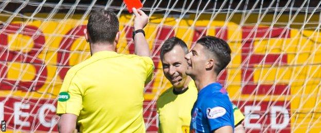 Referee Craig Thomson showed his assistant Andrew McWilliam a red card after he was sick
