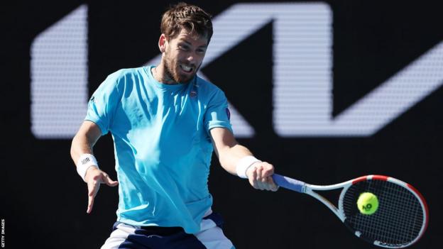 Cameron Norrie hits a forehand