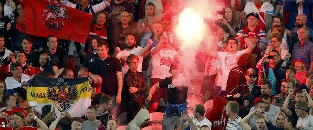 A flare was used by Russian fans after their side scored a consolation goal