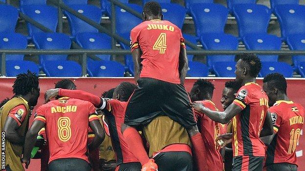 Uganda celebrate after scoring against Mali