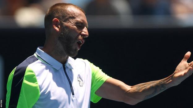 Dan Evans looking frustrated on his way to defeat at this year's Australian Open