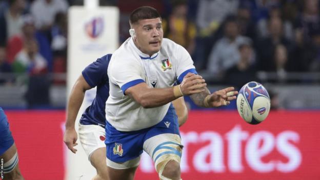 Marco Riccioni throws the ball for Italy during their World Cup game with France