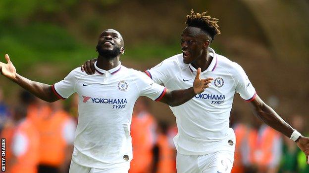 Fikayo Tomori and Tammy Abraham celebrate a goal for Chelsea together