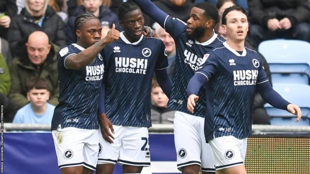 Romain Esse celebrates his second Millwall goal - on only his second start