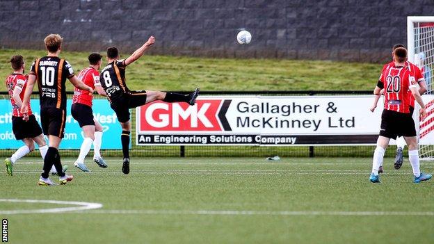 Robbie Benson fires in Dundalk's first-half goal at the Brandywell