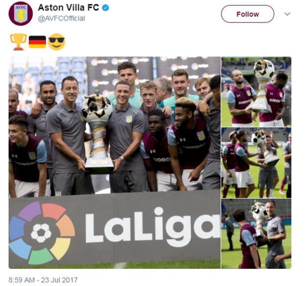 Aston Villa holding the Cup of Traditions