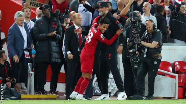 Fabio Carvalho celebrates with Jurgen Klopp