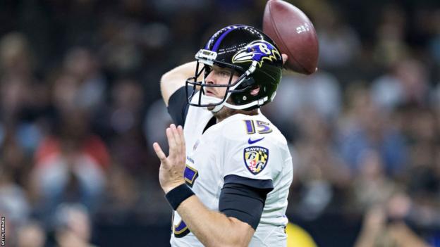 Ryan Mallett throws a pass playing for the Baltimore Ravens