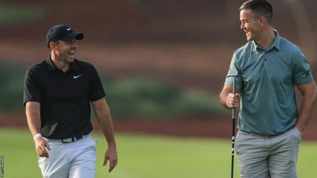 Rory McIlroy and Johnny Sexton chatting