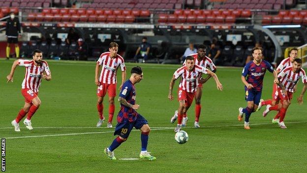 Lionel Messi scores a Panenka penalty against Atletico Madrid