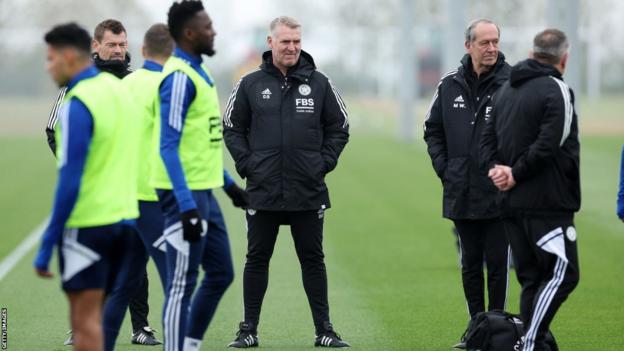 Dean Smith looks on during a Leicester training session