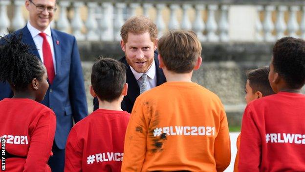 Prince Harry meets children playing rugby league at Buckingham Palace