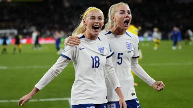 Chloe Kelly and Alex Greenwood celebrate victory over Nigeria