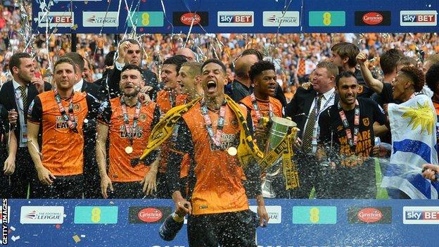 Hull City celebrate winning the Championship play-off final at Wembley in May 2016.