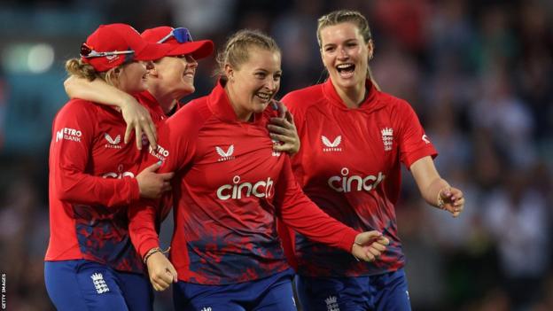 Sophie Ecclestone (middle) celebrates a wicket with Charlie Dean, Heather Knight and Lauren Bell