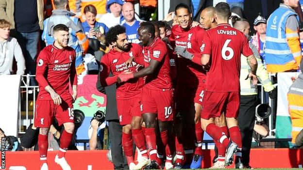 Liverpool's players celebrate scoring against Cardiff City