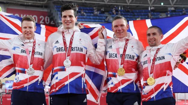 Tandem pairs James Ball and Lewis Stewart, and Matt Rotherham and Neil Fachie celebrate in Tokyo