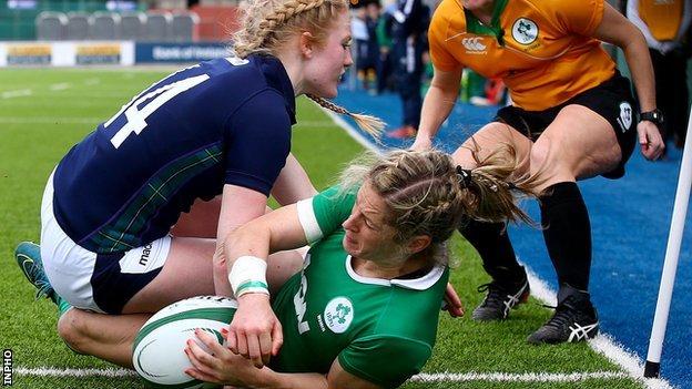Ireland winger Alison Miller scores her third try in the game against Scotland