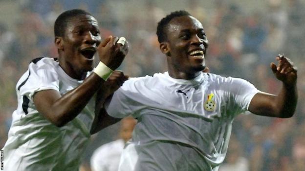 Asamoah Gyan and Michael Essien celebrate a goal for Ghana