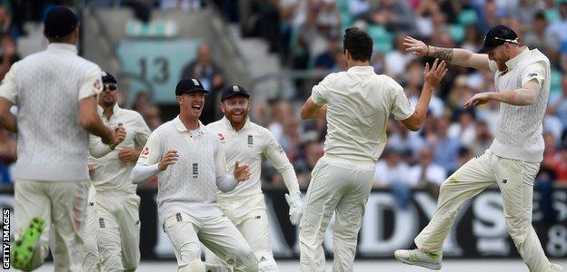 England's Toby Roland-Jones celebrates a wicket