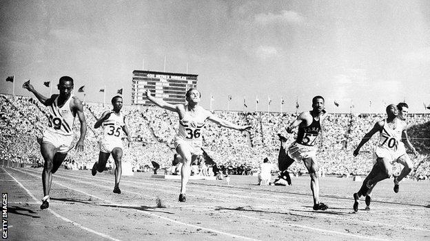 Harrison Dillard wins the 1948 Olympic 100m title in London