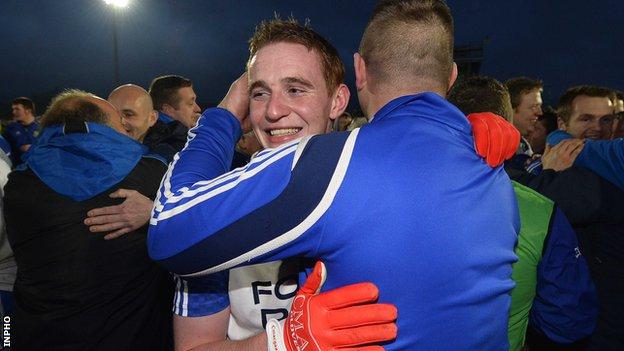 Aaron Devlin celebrates after Ballinderry win the Ulster club title in 2013
